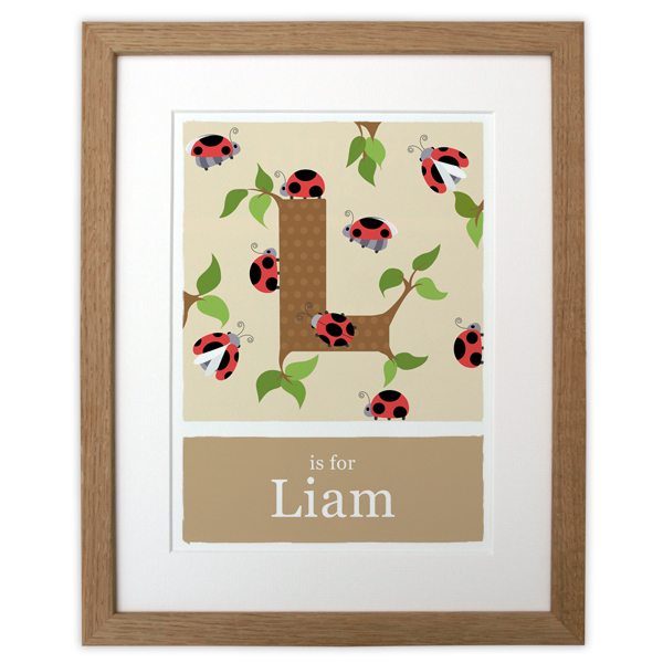 personalised alphabet ladybird print in a solid oak frame